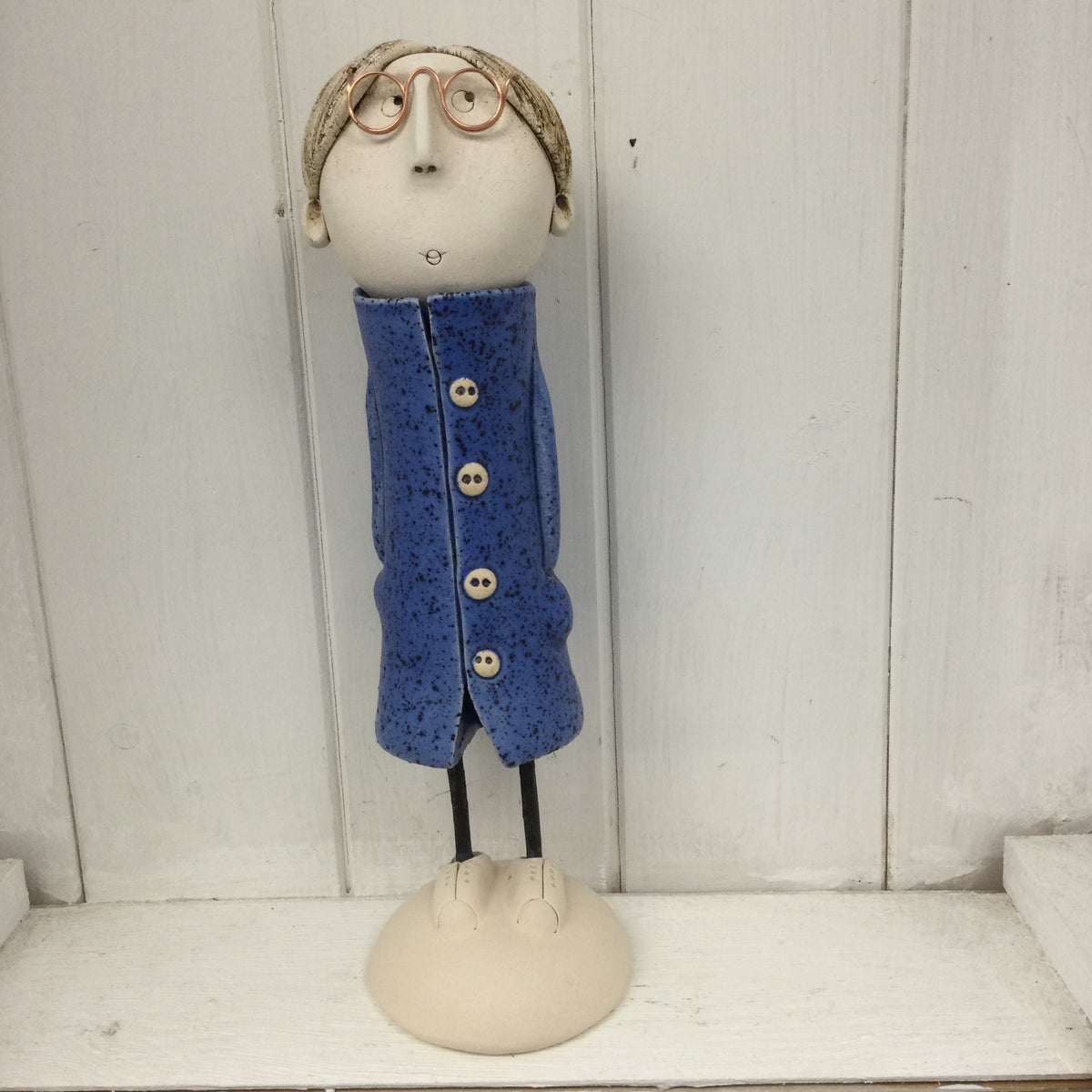 Ceramic Man in a Navy Coat