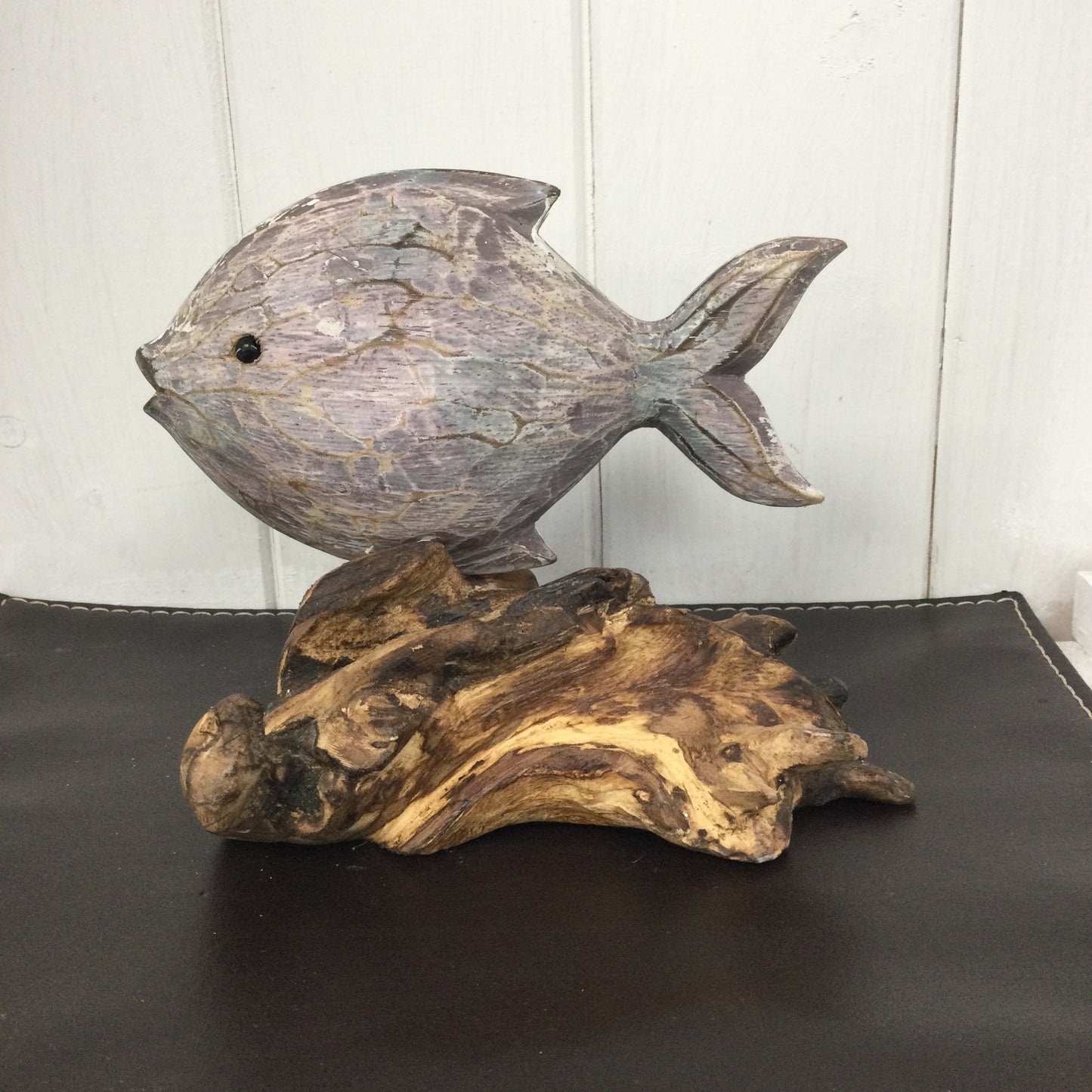 Abstract fish on root