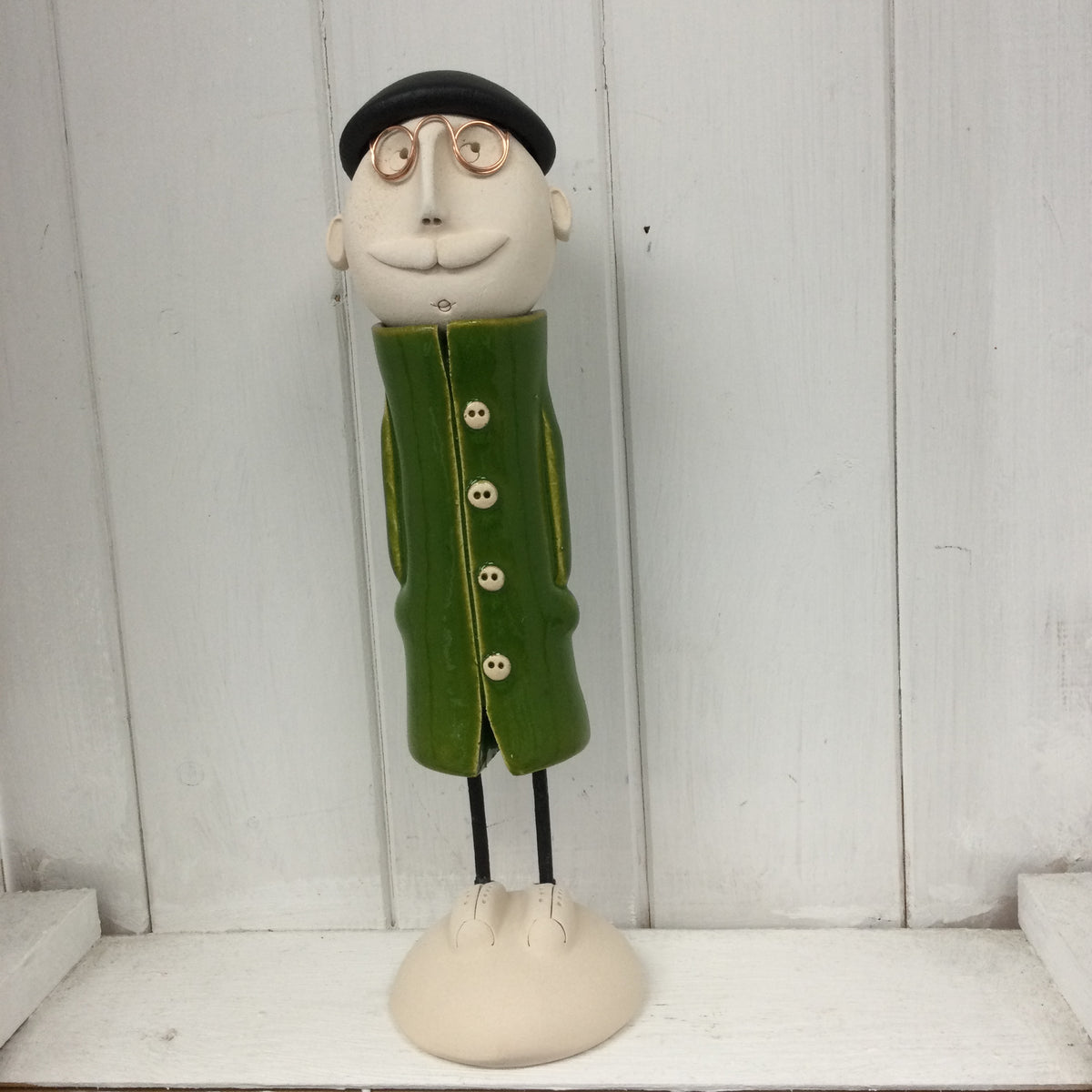 Ceramic Man with moustache, beret and a green coat