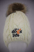 Load image into Gallery viewer, Cable Beanie with Faux Fur Pom: It&#39;s a dogs life

