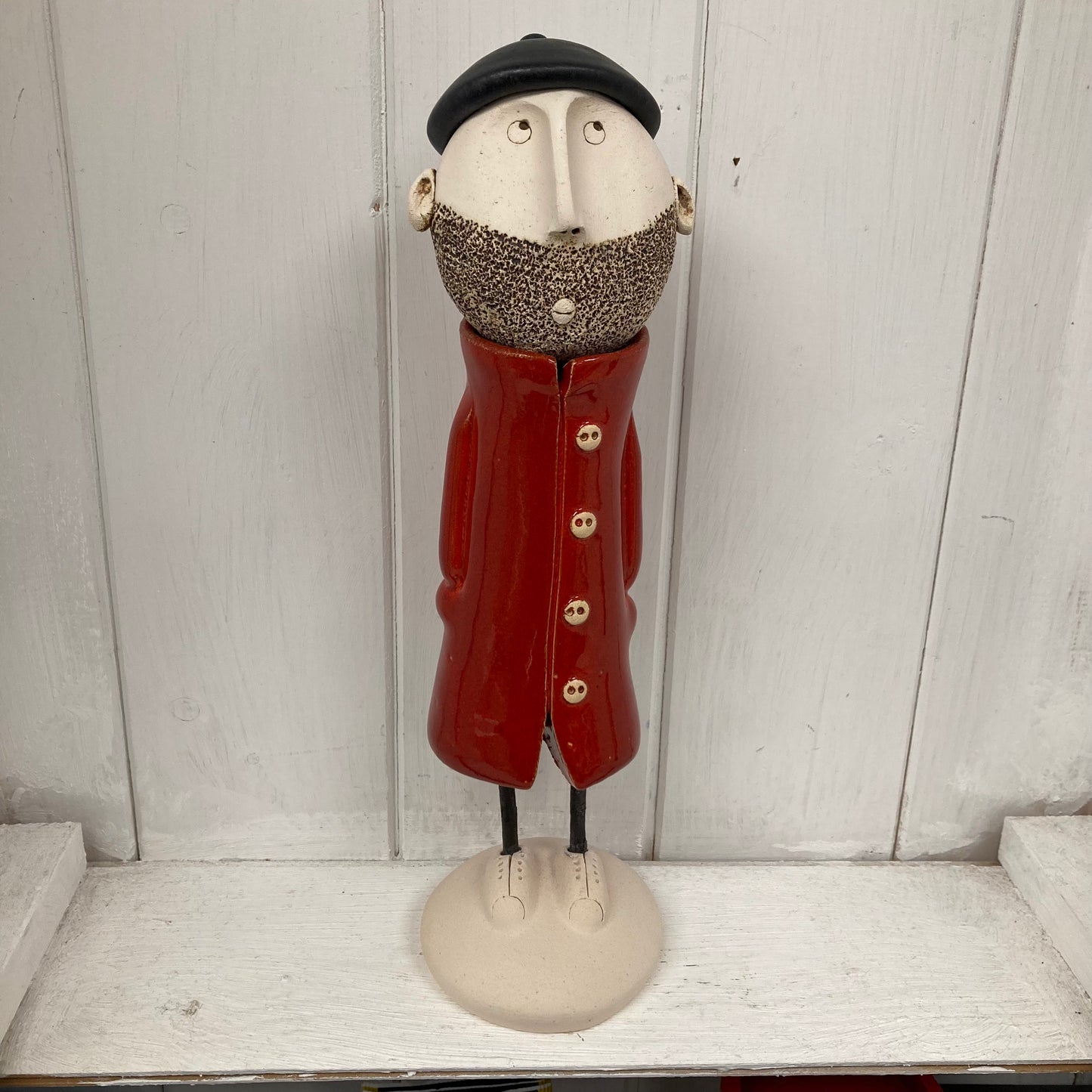 Ceramic Man with beard, beret and a red great coat