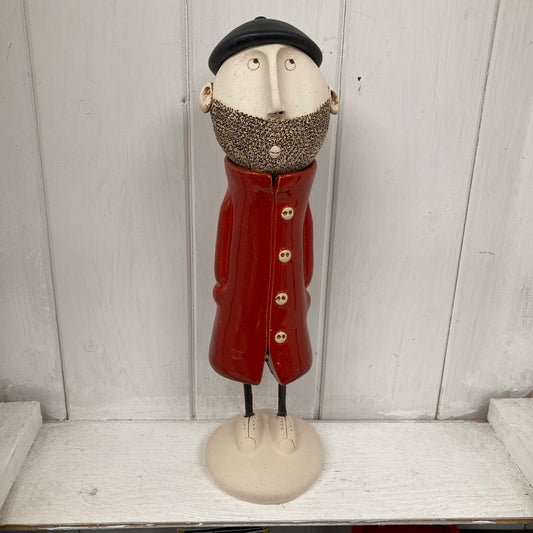Ceramic Man with beard, beret and a red great coat